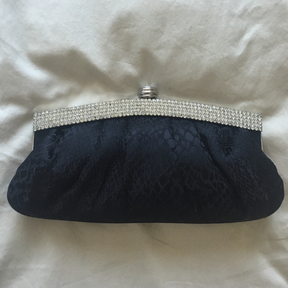 Satin evening clutch with snake skin pattern